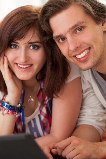 Young beautiful couple at home