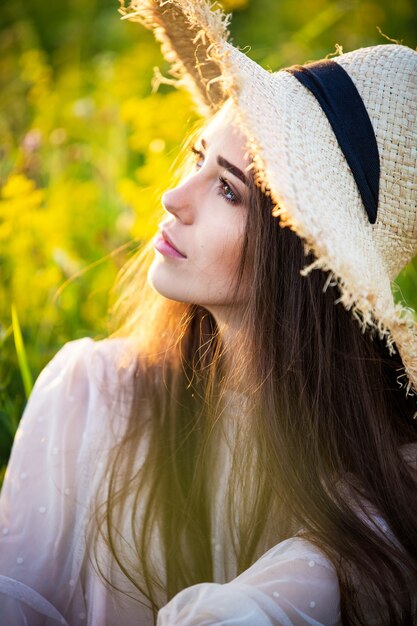 Young beautiful european girl in the setting sun