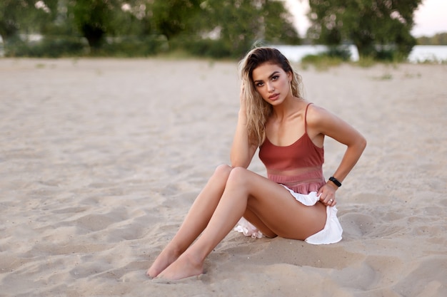 Young beautiful girl at the beach