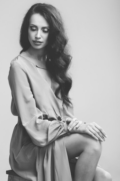 Young beautiful girl posing in the studio.