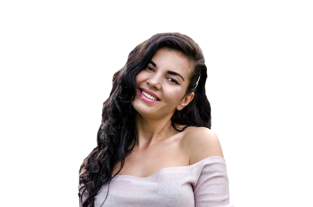 Young beautiful girl smiles and looks at the camera on a white background