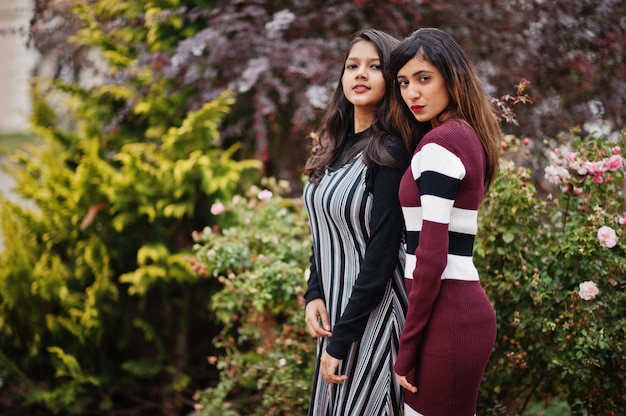 young beautiful girls walking together on the street