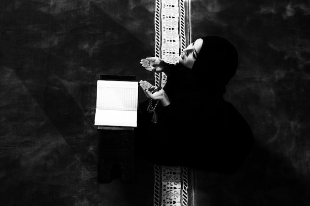 Young Beautiful Muslim Woman Praying in Mosque