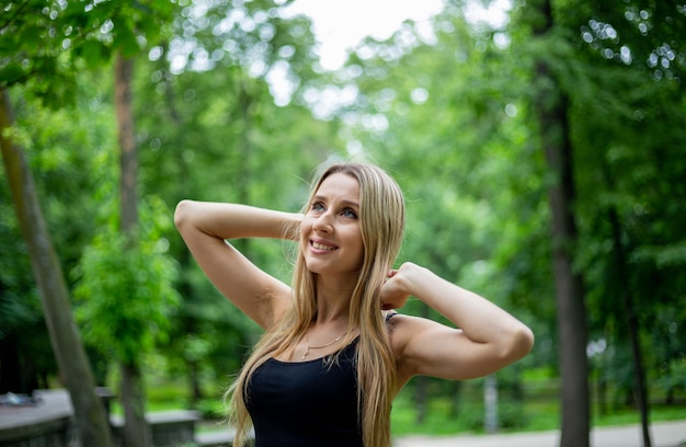 Young beautiful sporty blonde woman