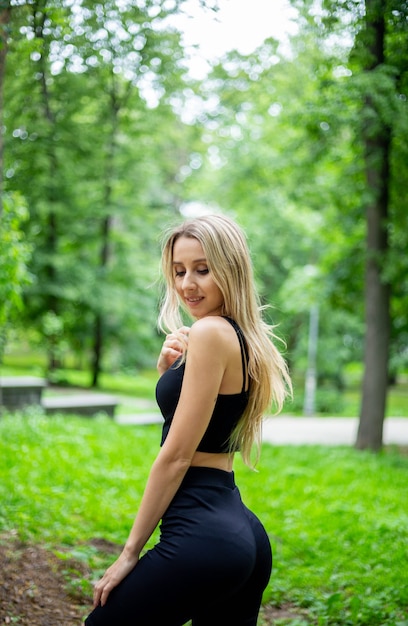 Young beautiful sporty blonde woman