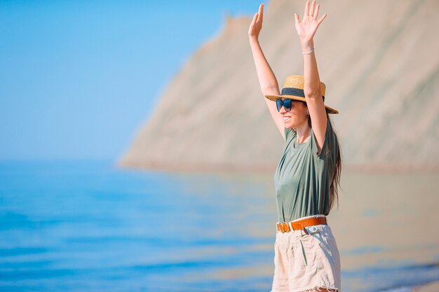 Young beautiful woman on the beach