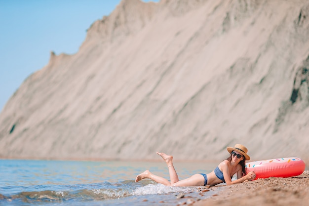 Young beautiful woman on the beach