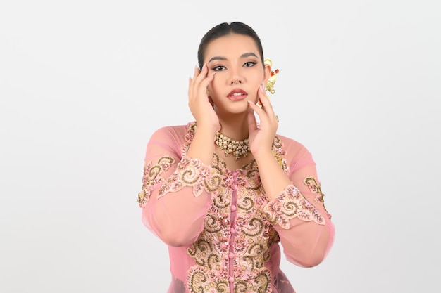 Young beautiful woman dress up local culture southern region showing beauty face posture