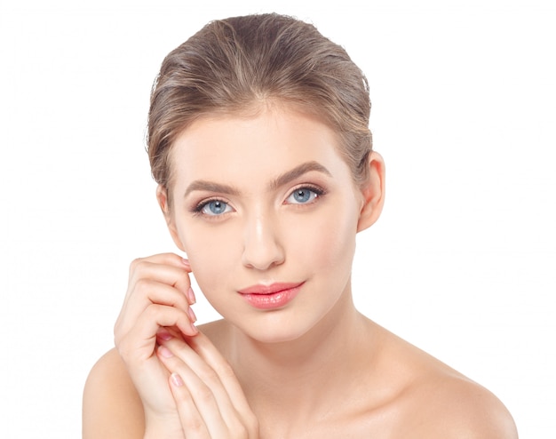 Young beautiful woman face portrait with healthy skin.