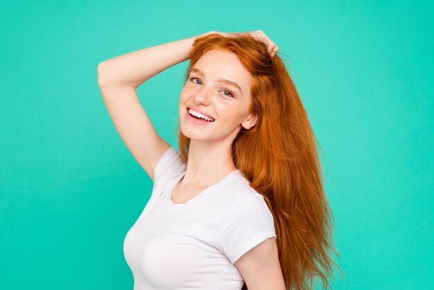 Young beautiful woman on a green background