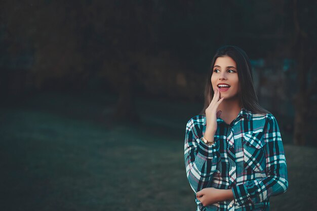 The young beautiful woman plants deliciously hands and is surprised. 