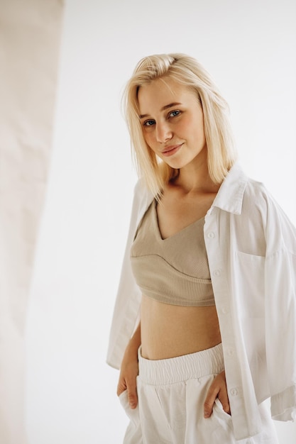 Young beautiful woman posing in studio