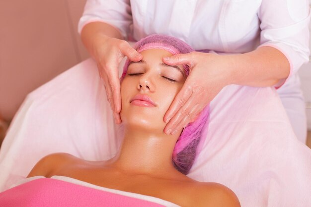 Young beautiful woman in process of massage