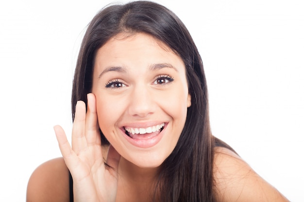 Young beautiful woman shouting something.