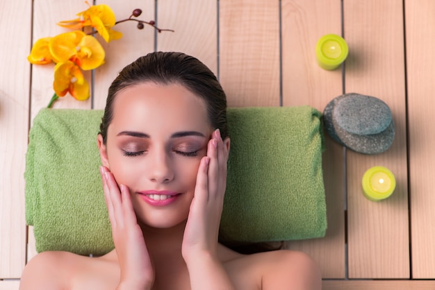 Young beautiful woman during spa procedure