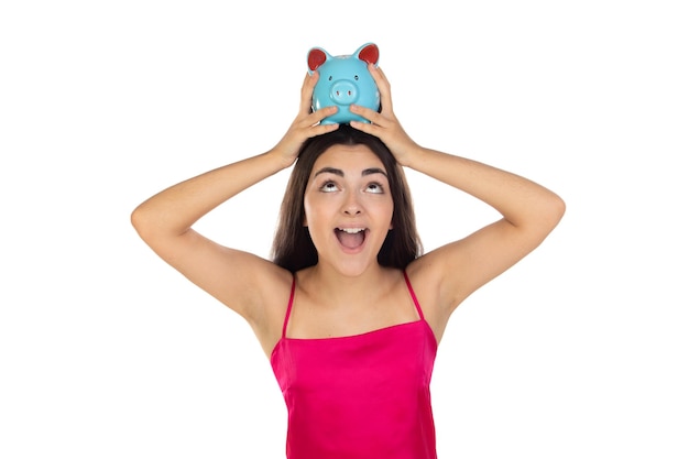 Young beautiful woman standing with piggy bank money box