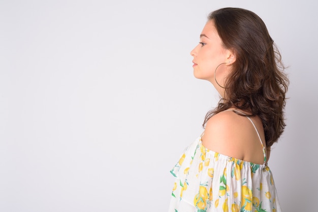 Photo young beautiful woman wearing floral off shoulder dress