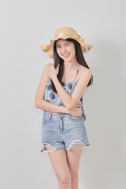 Young beautiful woman wearing hat