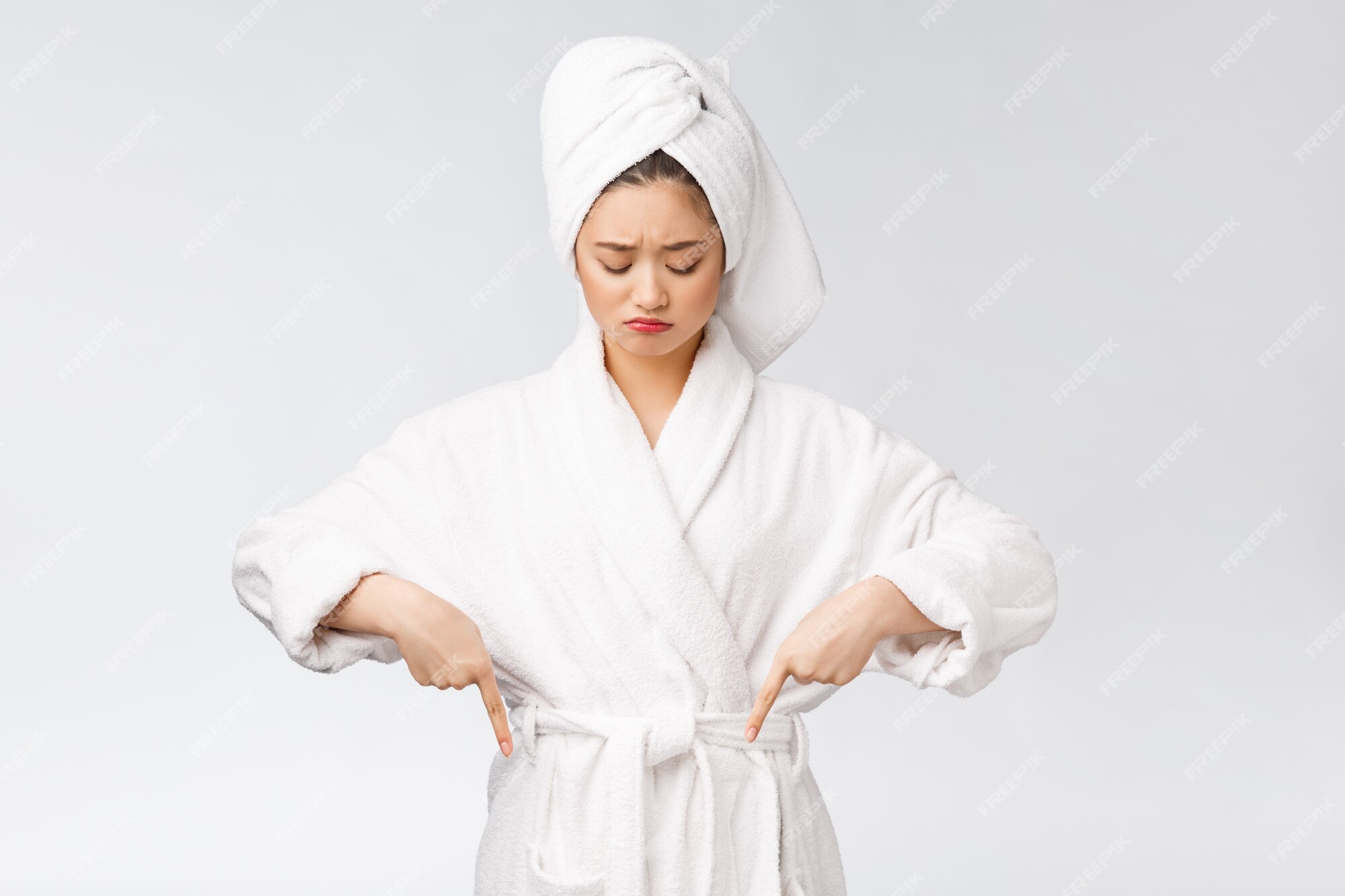 Beautiful young woman's back after shower with red towel Stock Photo