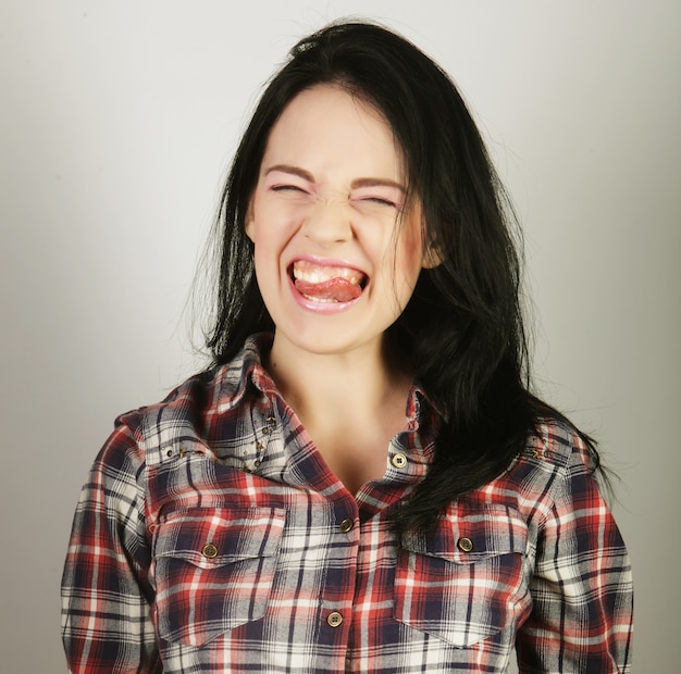 Young beautiful woman over white background