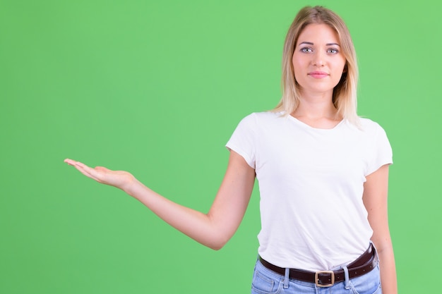 young beautiful woman with blond hair on chroma key on green