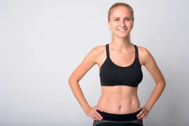 young beautiful woman with blond hair ready for gym