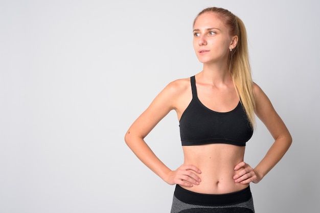 young beautiful woman with blond hair ready for gym