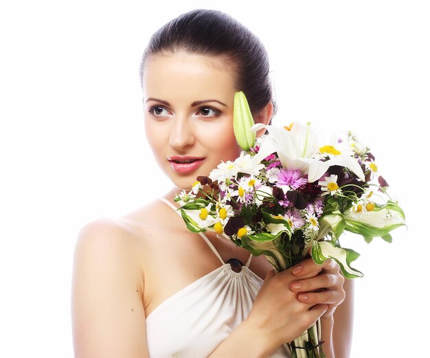 Young beautiful woman with bouquet Happy day