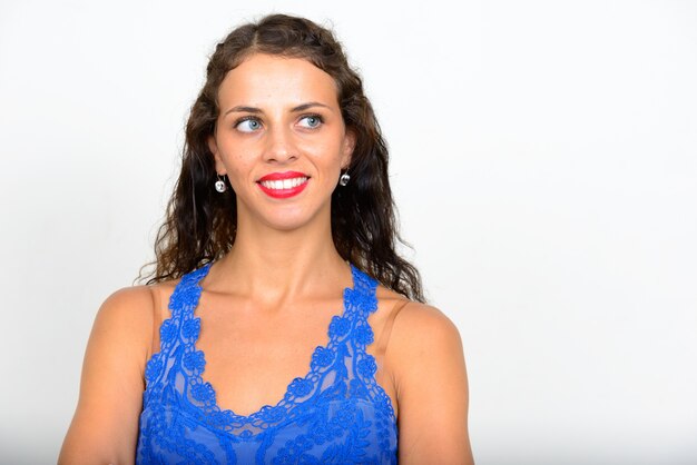 young beautiful woman with curly hair on white