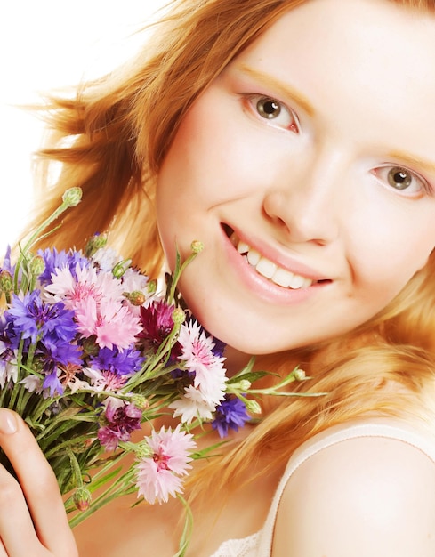 Young beautiful woman with flowers