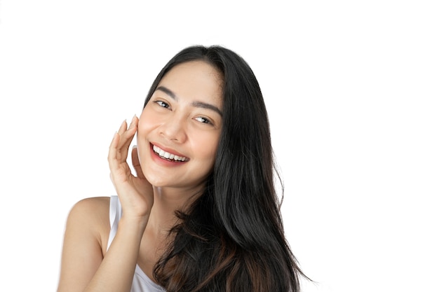 Young beautiful woman with long black hair smiling poses