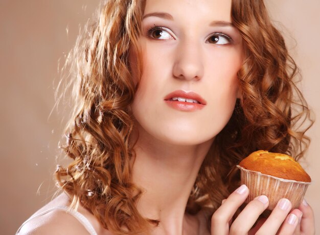 Young beauty girl with cake