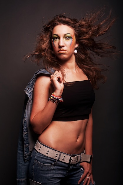 Young beauty woman posing in studio