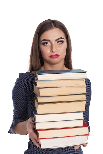 Young beauty woman with books at white background