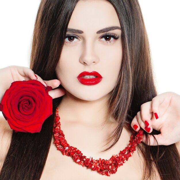 Young Beauty. Woman with Makeup. Red Lips and Nails. Shiny Hair