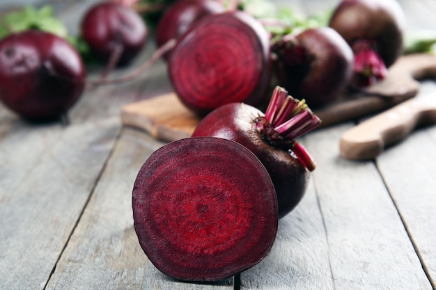 Young beets on wooden table close up