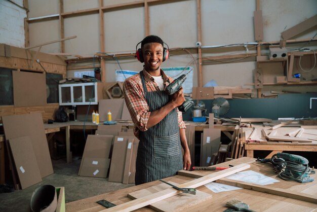 Young black african american working with power tools