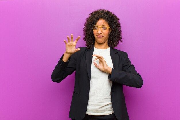 Young black business woman feeling disgusted and nauseous