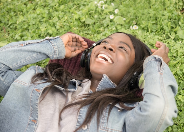 Young black girl in the meadow