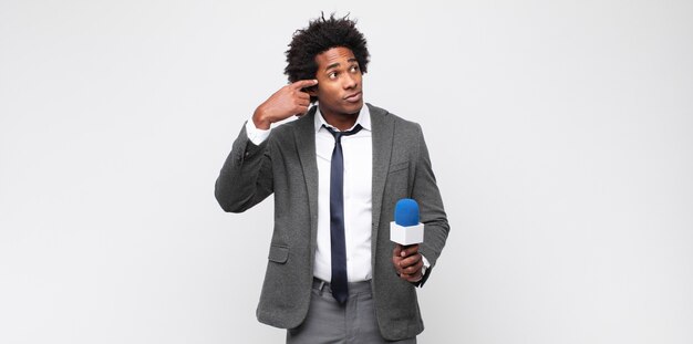 Young black man as a tv presenter