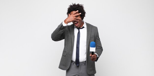 Young black man as a tv presenter