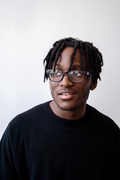young black man student wearing glasses