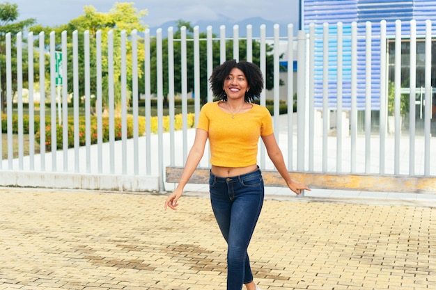 Young black woman in the street