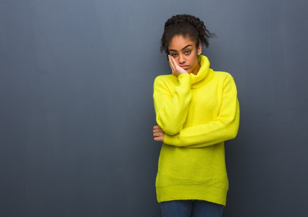 Young black woman tired and very sleepy