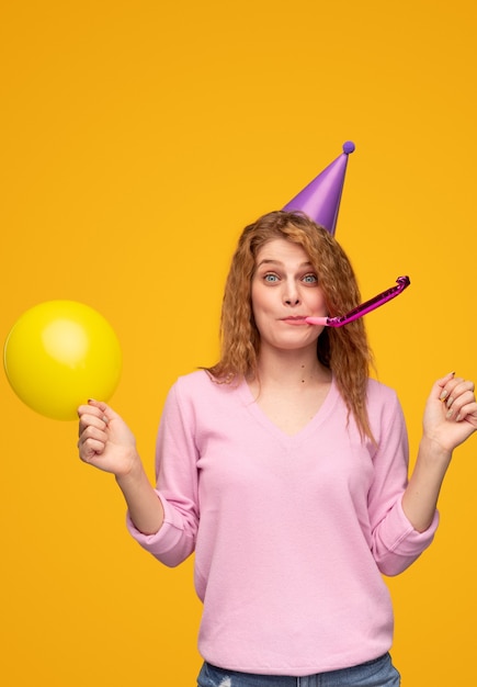 Young blond female celebrating birthday