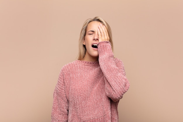 Young blond woman posing