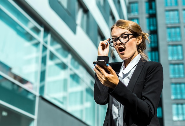 Young blonde caucasian businesswoman wears glasses