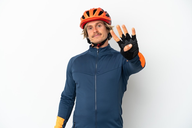 Young blonde cyclist man isolated happy and counting four with fingers