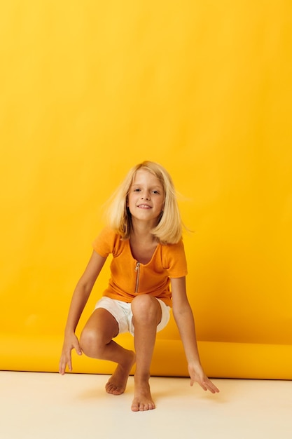 Young blonde girl smile hand gestures posing casual wear fun isolated background unaltered