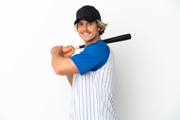 Young blonde man isolated playing baseball